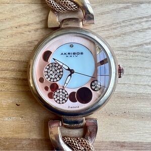 Akribos XXIV ladies rose gold tone fashion bracelet watch NEW BATTERY